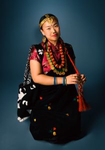 The purpose of this image is to show what women from Nepal traditionally wear on special occasions.